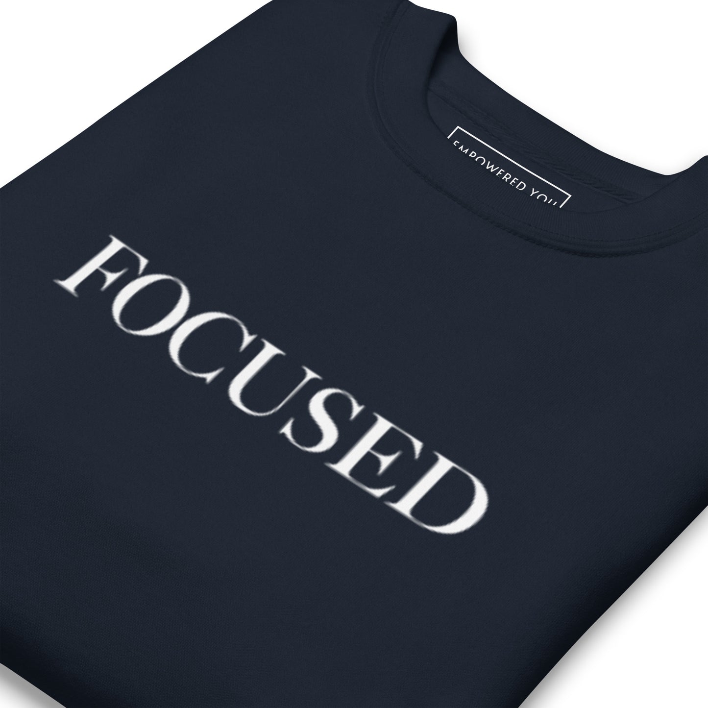 "FOCUSED" in white text (Front) & "Be the energy you want to attract" in white text (Back) - Premium Sweatshirt - EMPOWERED YOU DESIGNS, LLC