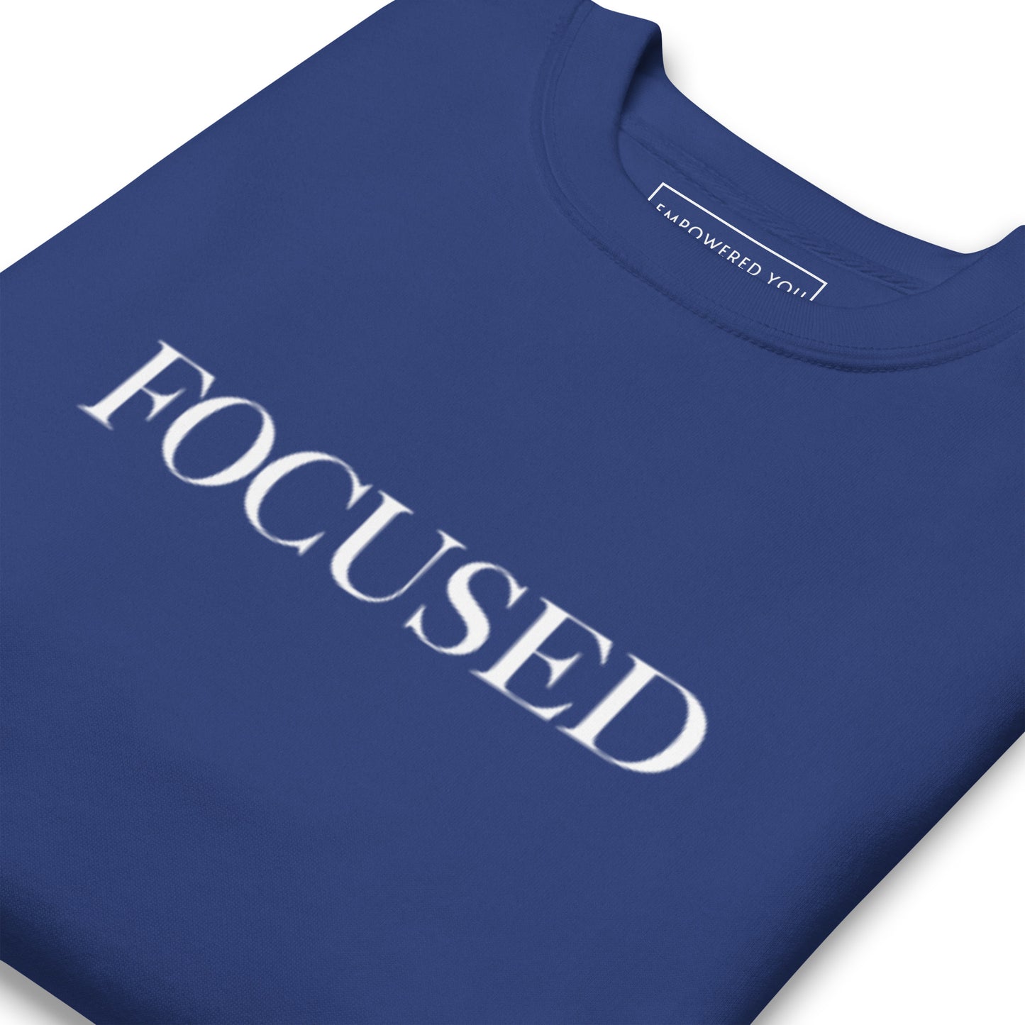 "FOCUSED" in white text (Front) & "Be the energy you want to attract" in white text (Back) - Premium Sweatshirt - EMPOWERED YOU DESIGNS, LLC