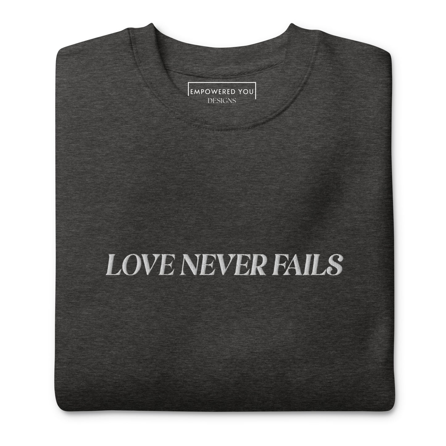 "LOVE NEVER FAILS" Embroidered Premium Cotton Sweatshirt (Unisex) - EMPOWERED YOU DESIGNS, LLC