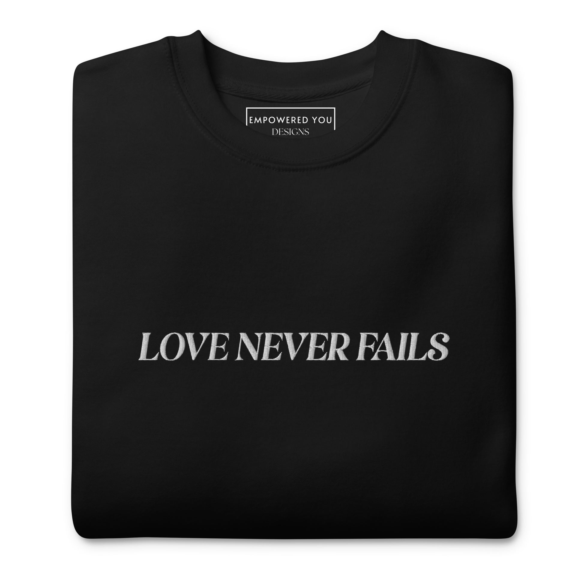 "LOVE NEVER FAILS" Embroidered Premium Cotton Sweatshirt (Unisex) - EMPOWERED YOU DESIGNS, LLC